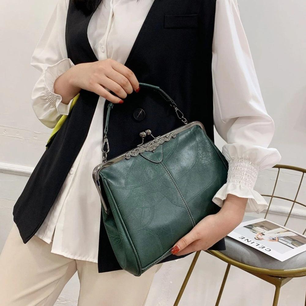 Mila | Vintage handtas met klepsluiting